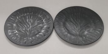 Two Lalique France black ground glass plates. 28 cm diameter.