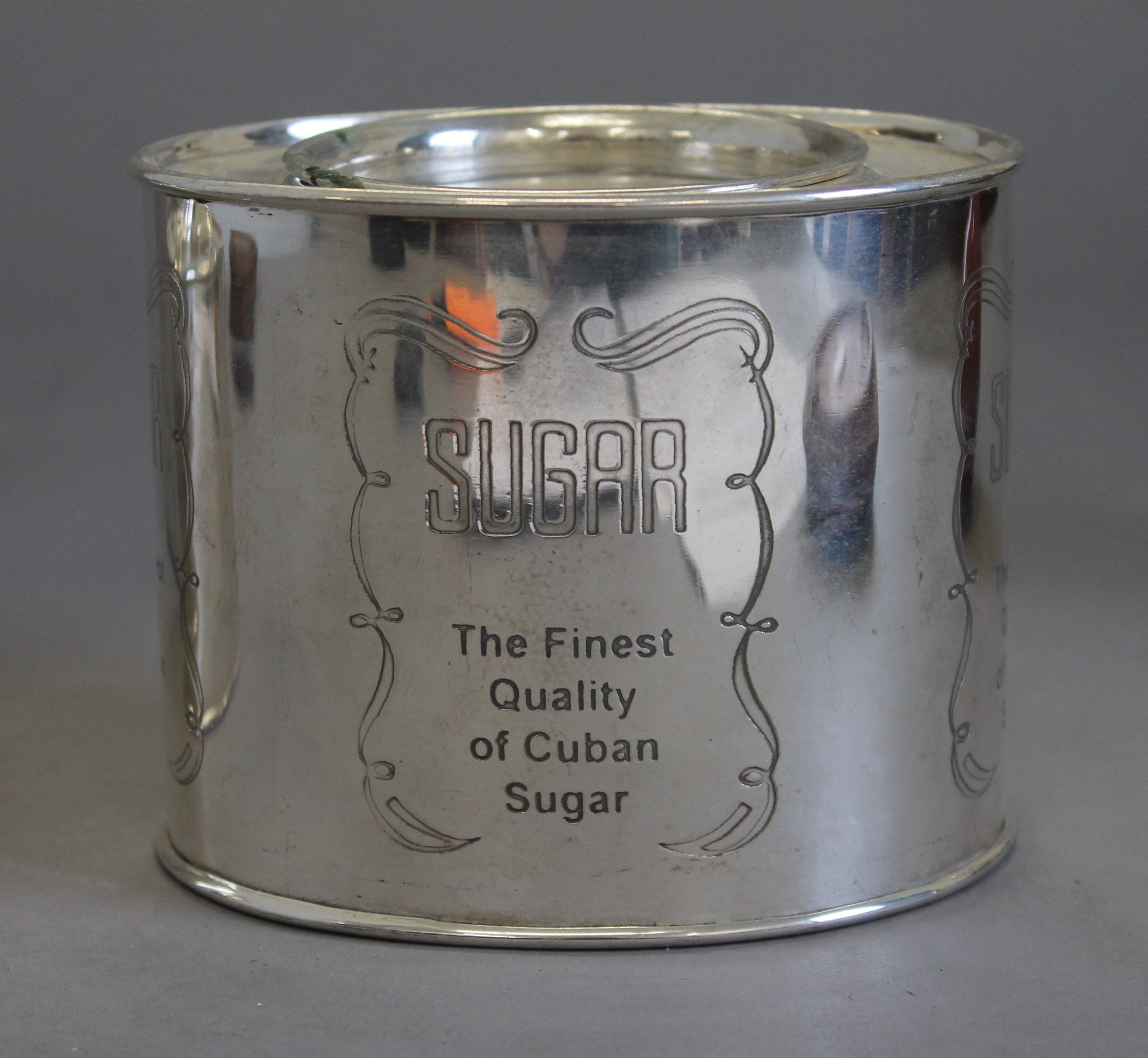 A set of three silver plated coffee and sugar tins. - Image 2 of 4