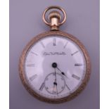 An Elgin gold plated pocket watch. 5.5 cm diameter.