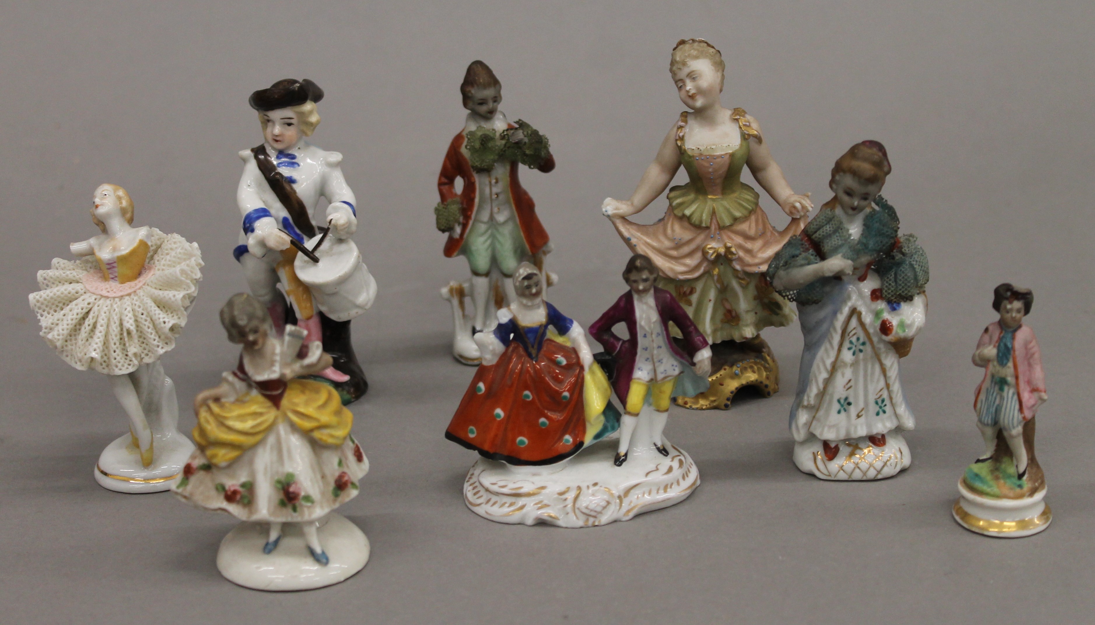 Eight Continental porcelain figurines, including Weiss.