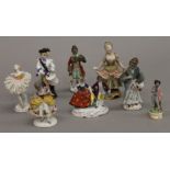 Eight Continental porcelain figurines, including Weiss.