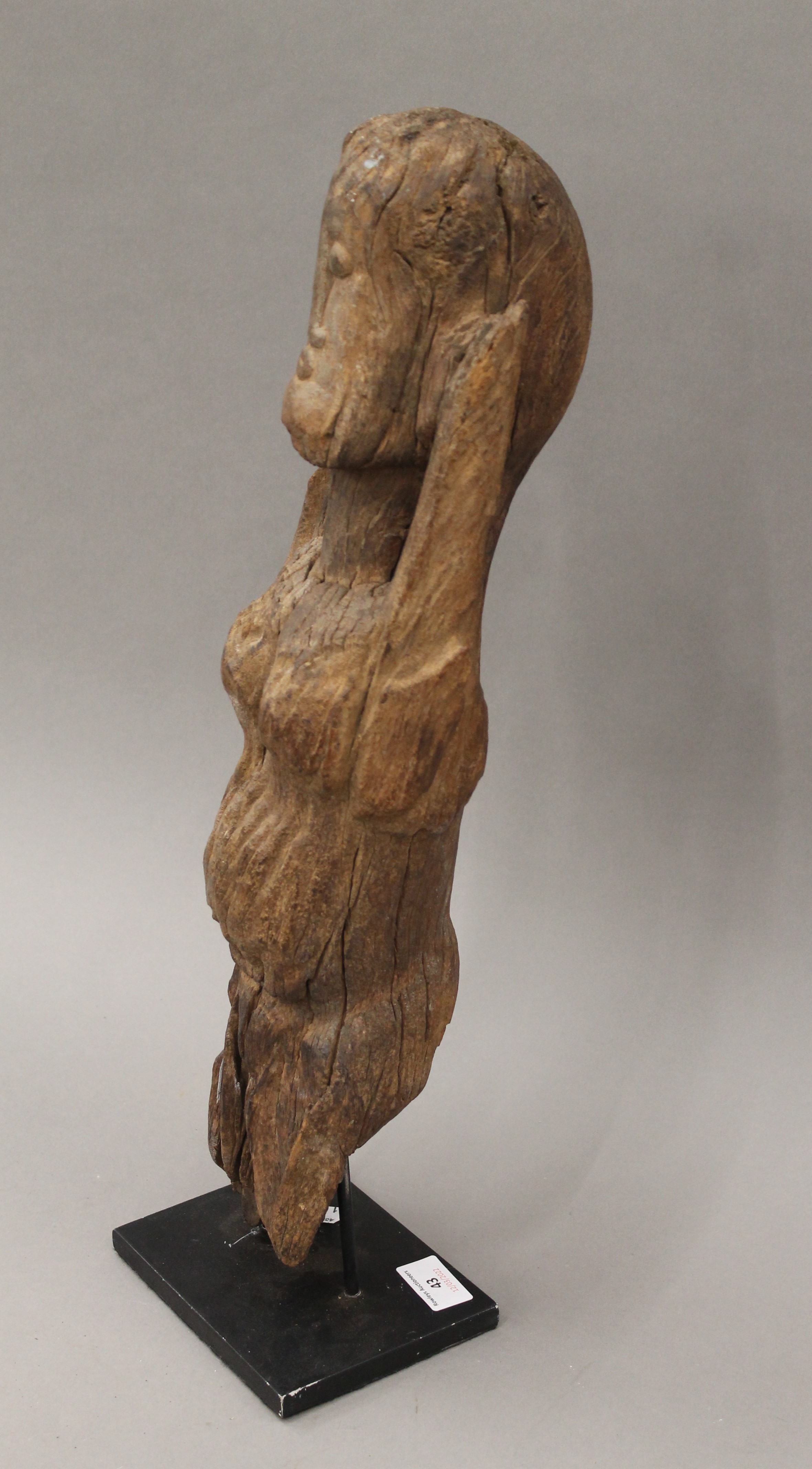 An African figural carving mounted on a later display plinth. 55 cm high. - Image 2 of 7