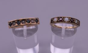 A 9 ct gold diamond and sapphire ring, and a 9 ct gold opal and garnet ring.