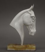 A Michael Sutty porcelain horse head. 20 cm high.