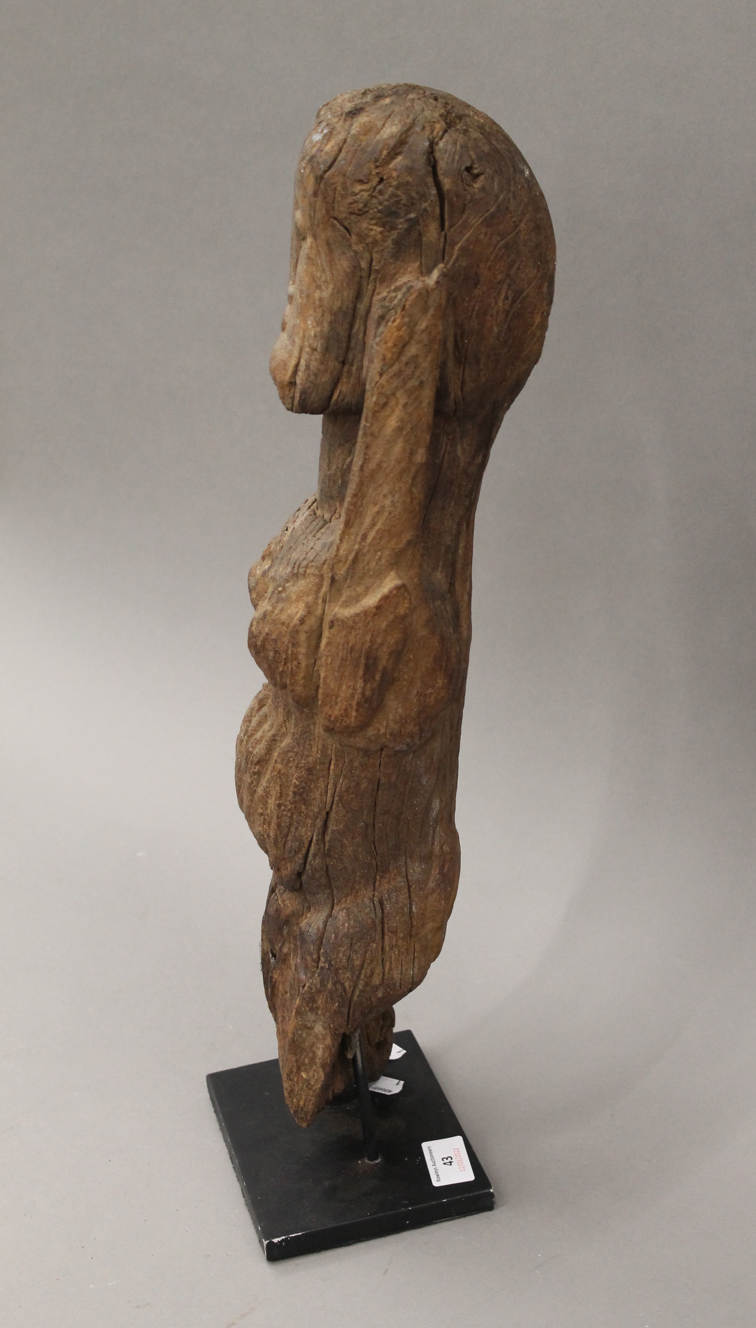 An African figural carving mounted on a later display plinth. 55 cm high. - Image 3 of 7