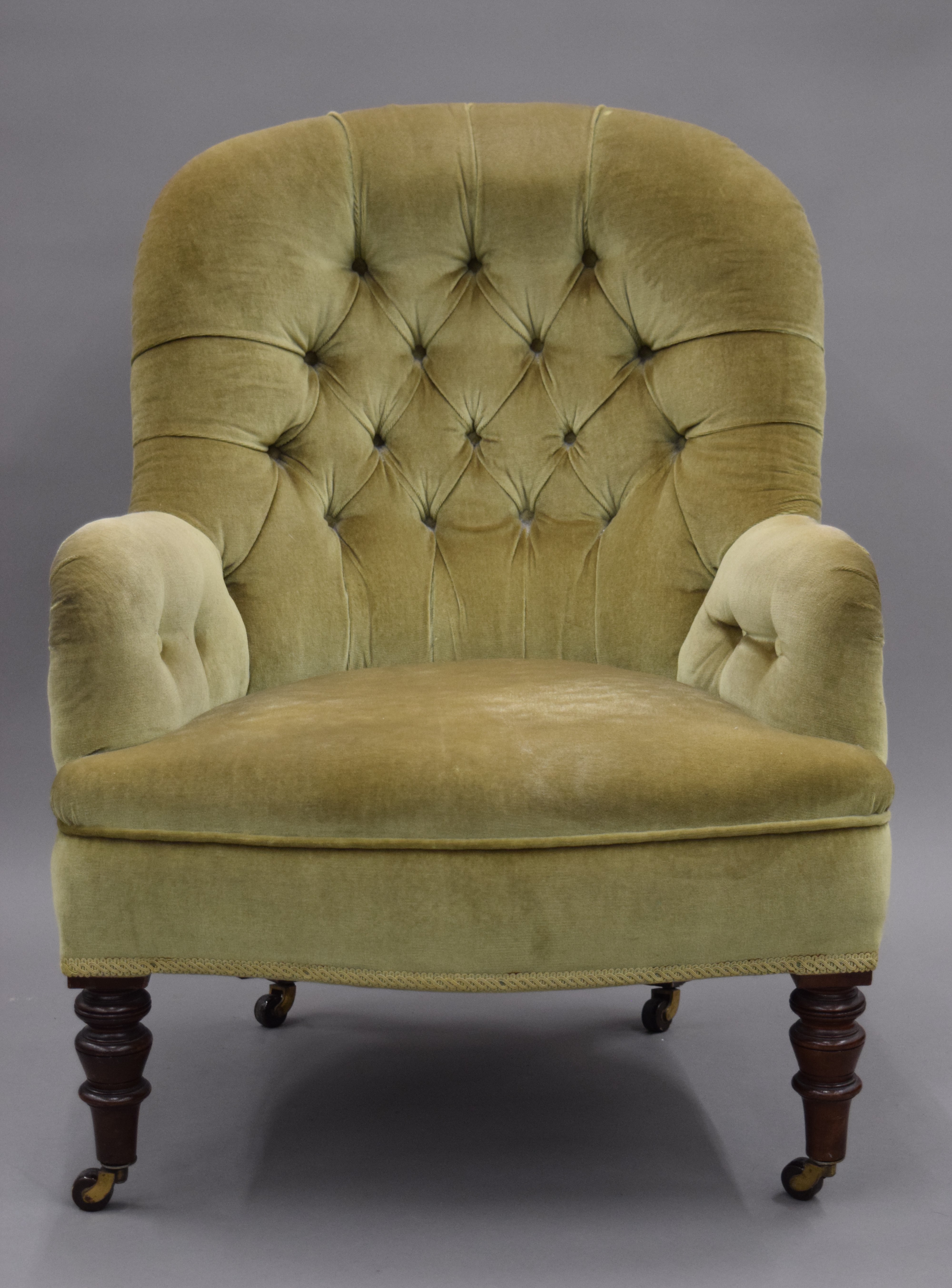 A Victorian upholstered button back arm chair. 65 cm wide. - Image 2 of 7