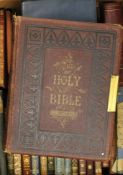 A Victorian Bible and other leather bound books including authors: Jane Austen, Dickens, Thackeray,