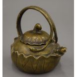 A Chinese bronze teapot with four character seal mark to base. 11 cm high.