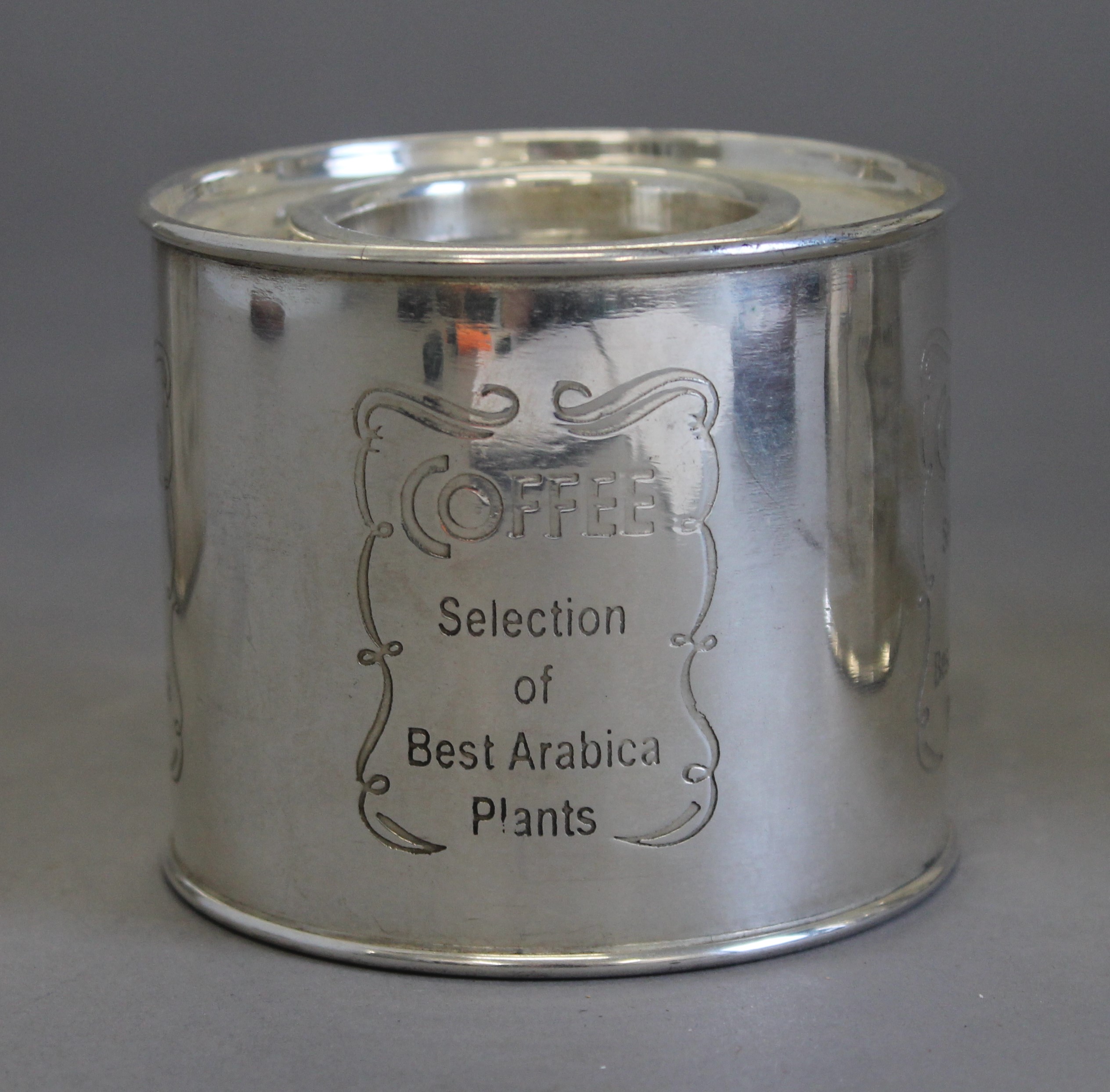 A set of three silver plated coffee and sugar tins. - Image 3 of 4