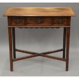 A 19th century three-drawer mahogany side table. 89 cm wide.