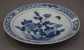 A 19th century Chinese blue and white porcelain dish. 29 cm diameter.