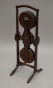 A mahogany monoplane folding cake stand. 79 cm high.