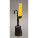 A wooden and wrought iron rush light holder. 20 cm high.