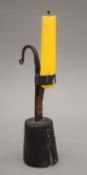 A wooden and wrought iron rush light holder. 20 cm high.