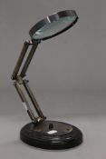 A large magnifying glass on stand.