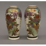 A pair of 19th century Japanese Satsuma hand painted vases. 15.5 cm high.