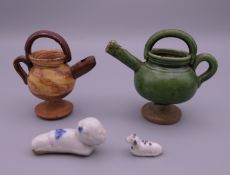 A Chinese porcelain whistle formed as a boy,