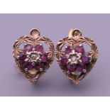 A pair of gold ruby and diamond earrings. 2.7 grammes total weight.