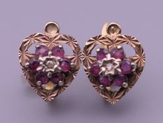 A pair of gold ruby and diamond earrings. 2.7 grammes total weight.