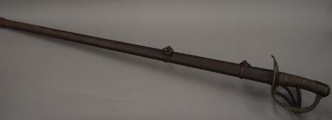 A 19th century Cavalry sword and scabbard. 115 cm long.