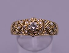 A 15 ct gold and diamond ring. Ring size V/W. 6.1 grammes total weight.