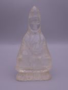A carved model of Guanyin. 11.5 cm high.