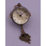 A pendant ball clock. 2.5 cm wide.