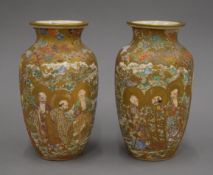A pair of 19th century Satsuma vases. 18 cm high.