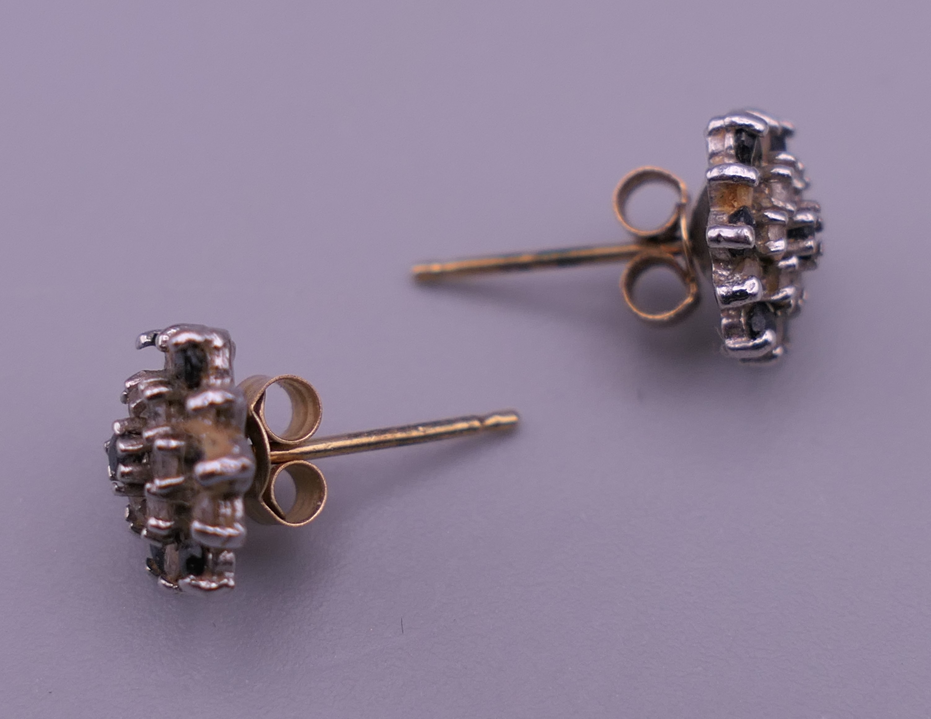 A pair of 9 ct gold and white gold sapphire earrings and matching pendant. 1.7 grammes total weight. - Image 5 of 5