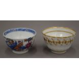 An 18th century New Hall tea bowl and another. The former 8.25 cm diameter.