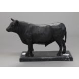 A bronze model of a bull. 25 cm long.