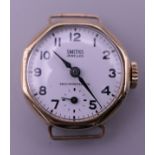 A 1950s Smiths 9 ct gold ladies wristwatch with a white dial, in working order.