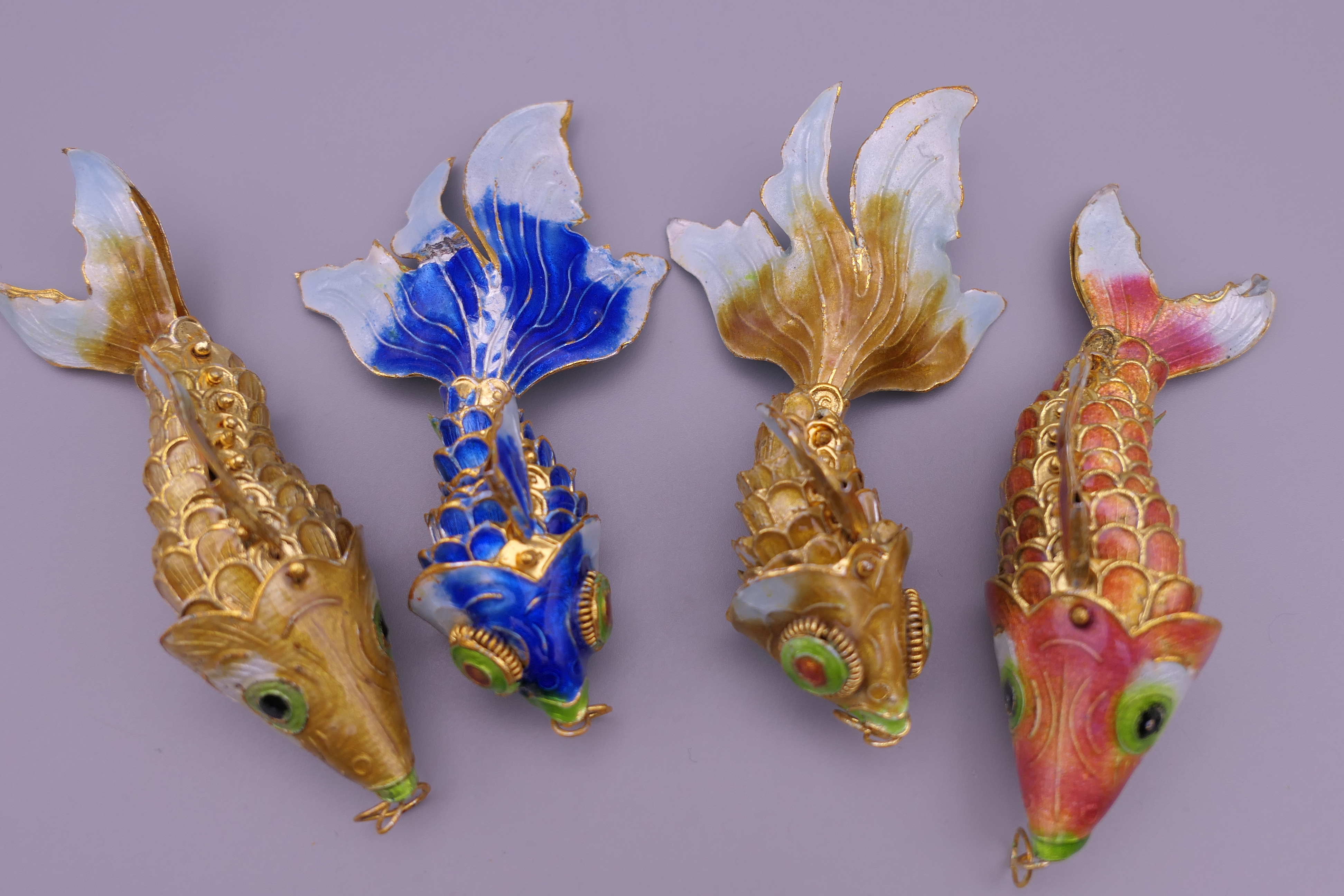 Four enamel decorated fish. The largest 9.5 cm long. - Image 2 of 4