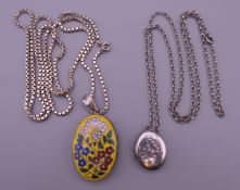 An enamel decorated silver locket on chain and another. The former 3.5 cm high.