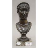 A 19th century bronze bust of a classical lady mounted on a marble plinth base. 27 cm high.