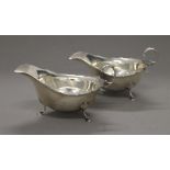 A pair of silver sauce boats. Each 14.5 cm long. 5.7 troy ounces.