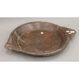 A large treen bowl. 60.5 cm wide.