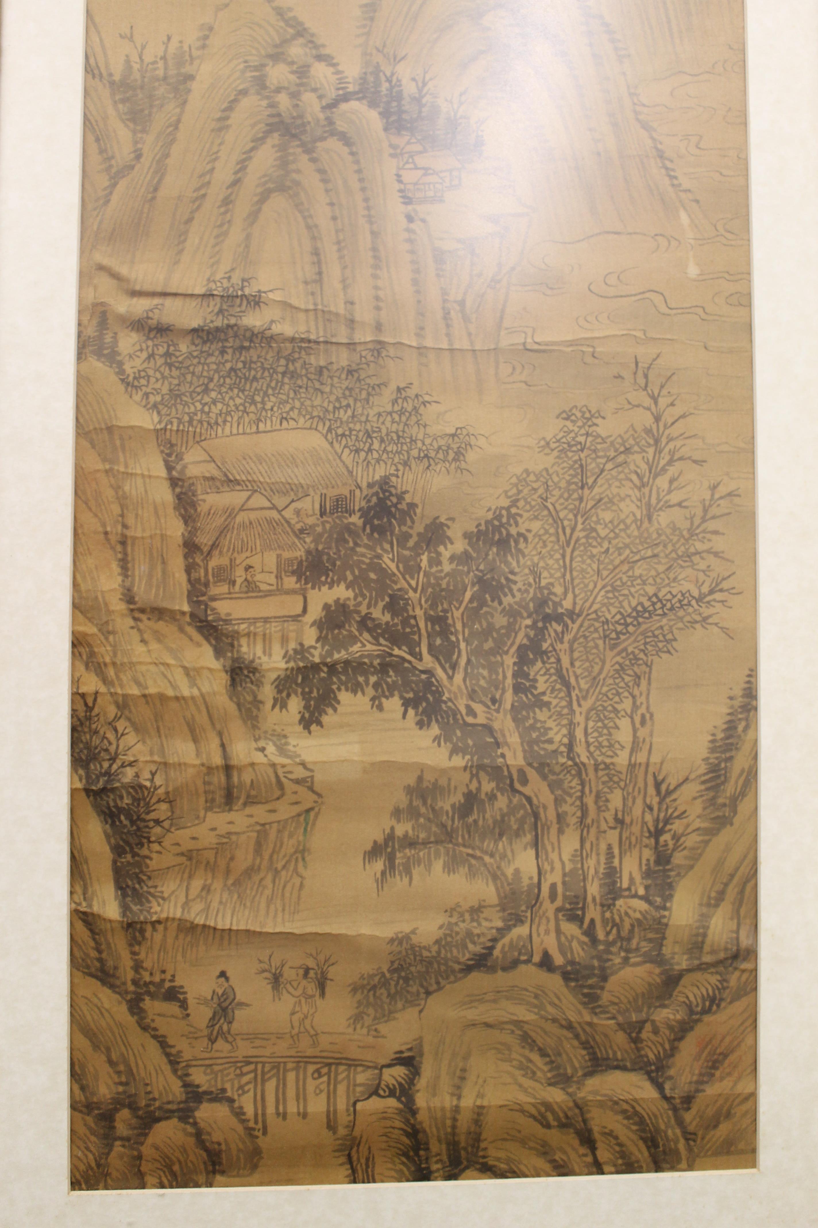 A 19th century Chinese silk scroll depicting Figures in a Mountainous Landscape, framed and glazed. - Image 5 of 9