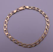 A 9 ct gold bracelet. 20 cm long. 7.3 grammes.