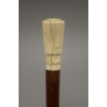 A Victorian ivory handled walking stick with detachable handle and ferrule, and hollow shaft. 88.