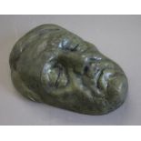 A bronze model of a death mask of Hitler. 25 cm high.
