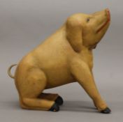 A model of a pig. 32 cm high.