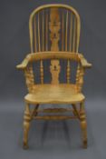 A modern stick back Windsor chair. 63 cm wide.