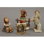 Three Hummel figures and a miniature gin barrel. The largest 14.5 cm high.