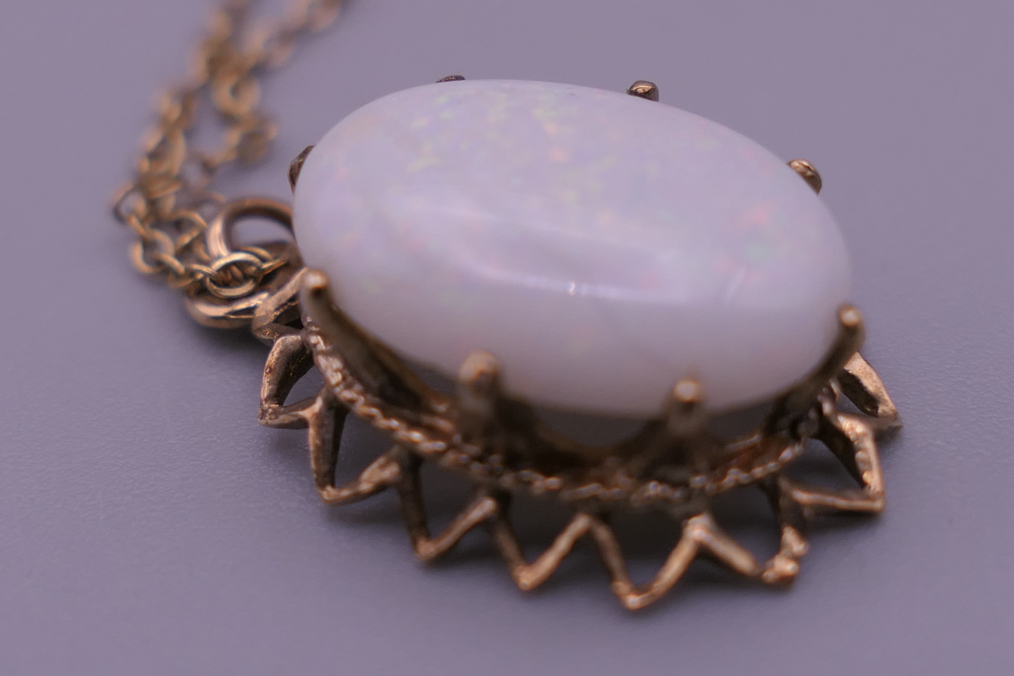 A 9 ct gold and opal pendant on chain. The pendant 2 cm high. 2.8 grammes total weight. - Image 3 of 7