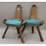 A pair of oak spinners chairs. 52 cm wide.