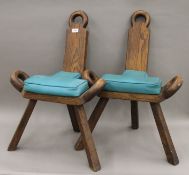 A pair of oak spinners chairs. 52 cm wide.