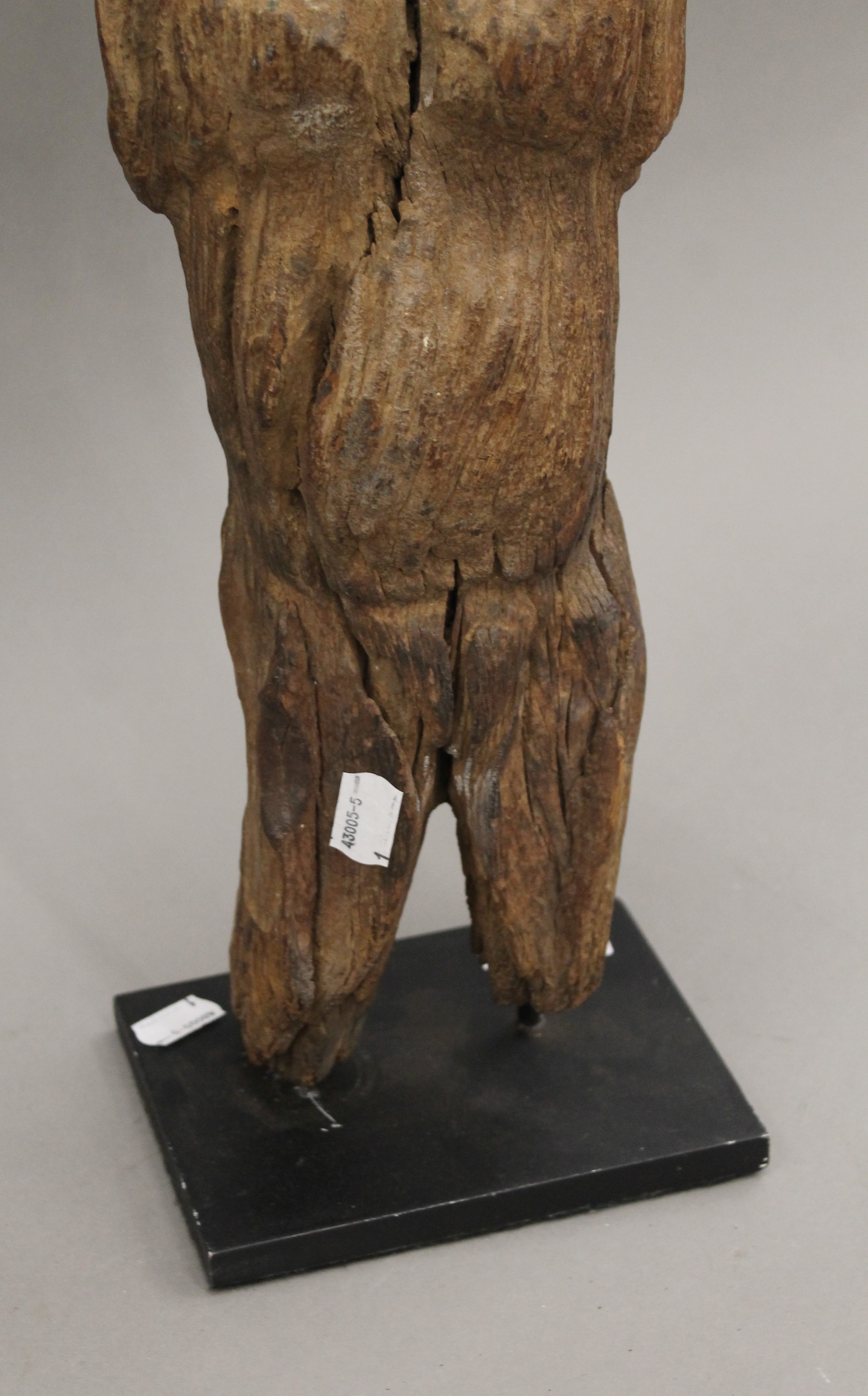 An African figural carving mounted on a later display plinth. 55 cm high. - Image 6 of 7