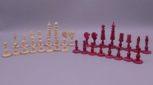 A small 19th century bone chess set. The Kings 6 cm high.