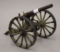 A scratch built model of an artillery canon. 23 cm long.